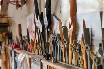 Broken airplane propellers after a failed landing in a workshop, the construction of the airplane.