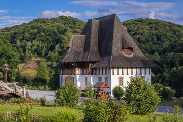 Fototapeta na wymiar Museum building in Barsana Monastery in Maramures region in Romania