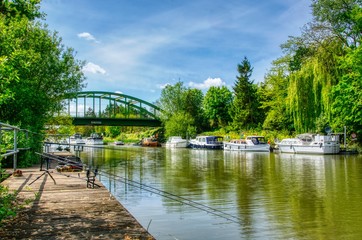 bridge over river with fishing lines