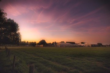 artistic sunset over field