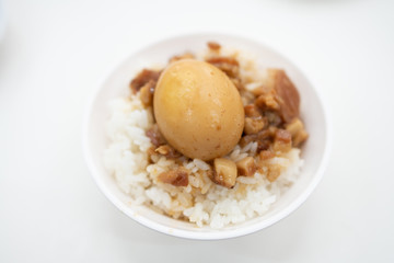 Braised pork and egg on rice. Soy-stewed pork rice. Taiwanese Cuisine