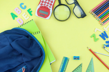 Student backpack and various school supplies. Studying, education and back to school concept....
