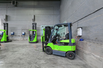 forklift charging in the warehouse