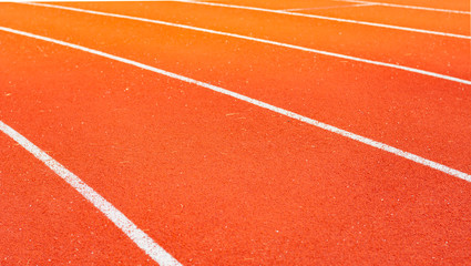 Fototapeta premium Red running track for athletics at stadium