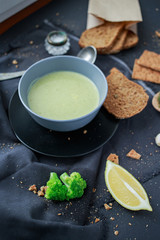 creamy coconut broccoli soup with spices and fresh bread. The concept of food for vegans. Vegetarianism.