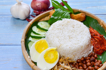 Nasi Lemak is commonly found food in Malaysia, Brunei and Singapore. It is an unofficial national food in Malaysia. Selective focus.