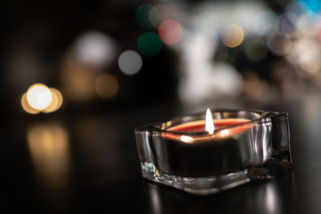 Glass Candle with defocused background