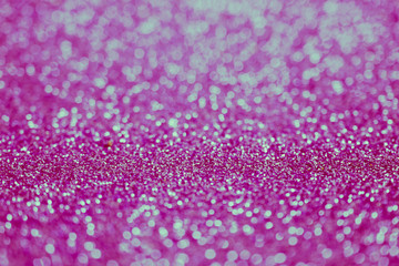 abstract blur or defocused lights bokeh pink glitter background select focus