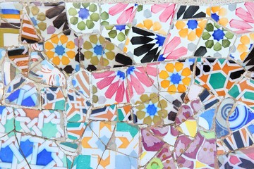 Mosaics by Gaudi in Park Guell in Barcelona, Spain. - obrazy, fototapety, plakaty