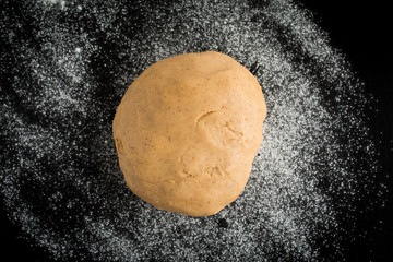 Dough on Wooden Background
