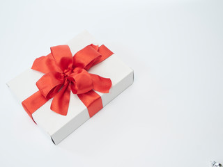 Gift boxes with red ribbon. Happy New Year 2020