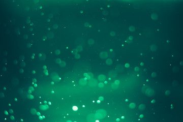 Fototapeta na wymiar abstract blur lights bokeh green background