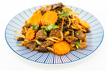 fried beef noodle food on the table