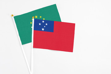 Samoa and Macao stick flags on white background. High quality fabric, miniature national flag....