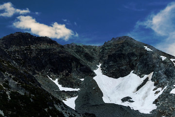 Obraz premium Black mountain with white snow, BC, Canada