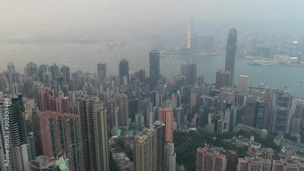 Wall mural Aerial view sunset at Victoria Harbor of Hong Kong 