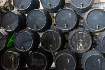 Production of fortified jerez, xeres, sherry wines in old oak barrels in sherry triangle, Jerez la Frontera, El Puerto Santa Maria and Sanlucar Barrameda Andalusia, Spain