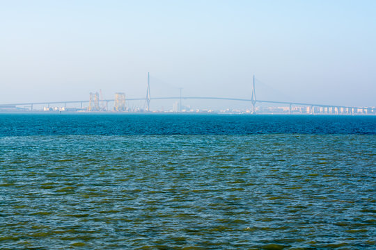 Halocline in water, visible border of fresh river water and salted ocean water with high salinity in Gulf of Cadiz, Andalusia, Spain