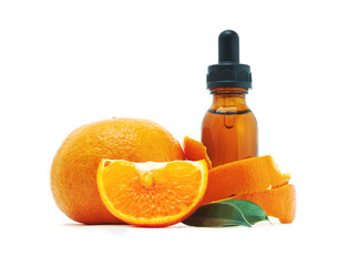 Serum extracted from oranges in glass bottles and oranges on white background
