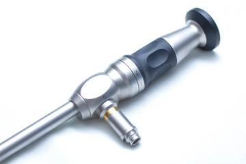 Surgical laparoscapia camera for surgery in urology of the kidneys, on a white isolated background. Optics Arthroscopy changes the angle of the angle from 0 to 120 degrees
