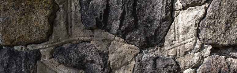 Stone and concrete texture in sunshine, panoramic shot