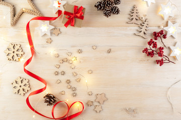 Christmas decorations made by hand in a festive decoration on a wooden table.