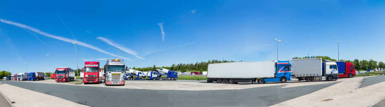 trucks park at a parking lot along the highway near Wuerzburg