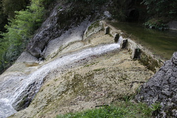 Fototapeta na wymiar particular waterfall by Molinetto della Croda