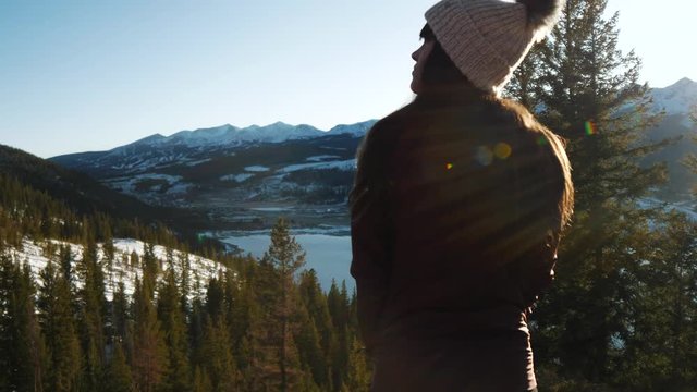 Woman Looks at Picturesque Cold Mountain Landscape