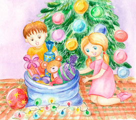 Children unpack Christmas gifts