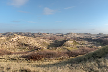 Fototapeta na wymiar View from a peak on a dune landscape