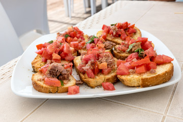 Appetizer of bruschetta with tuna