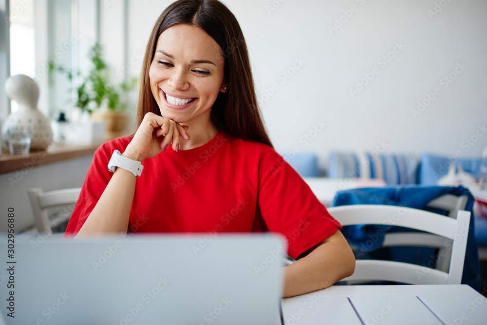 Poster cheerful young woman happy about good internet connection for making video call during free time,smi