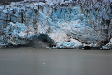 glacier calving in to the water