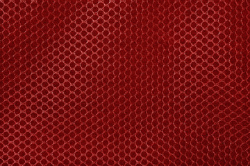Dark red honeycomb fiber texture and background