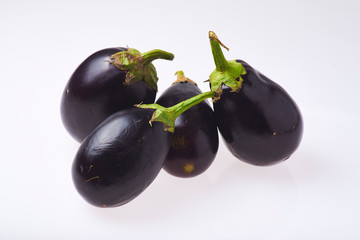 Isolated organic aubergines on a white background
