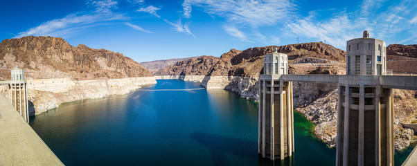 Panorama image looking into Lake Meade from the Hoover dam with the bleached high waterline of the...