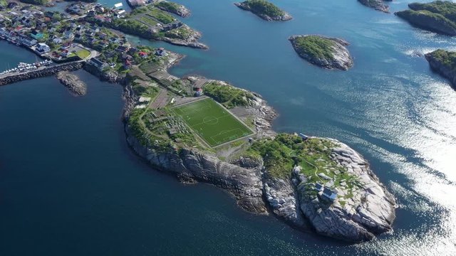aerial view. flight over football field in Henningsvaer village .Lofoten Islands,Norway