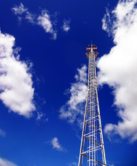 Fototapeta na wymiar High mast with lightning rod in the territory of the oil and gas refining complex