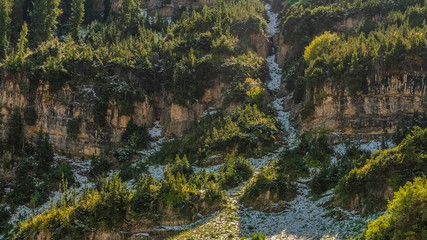 Panorama frame Steep mountain slopes on Mount Timpanogosn with snow
