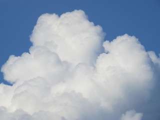 cloud in shape of heart on blue background
