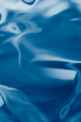 . Blue liquid shiny background.