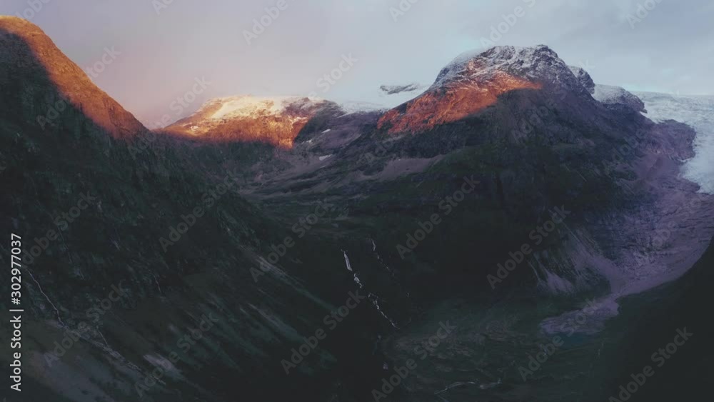 Wall mural Sunset mountains aerial view Norway landscape travel scenic destinations Jostedalsbreen national park