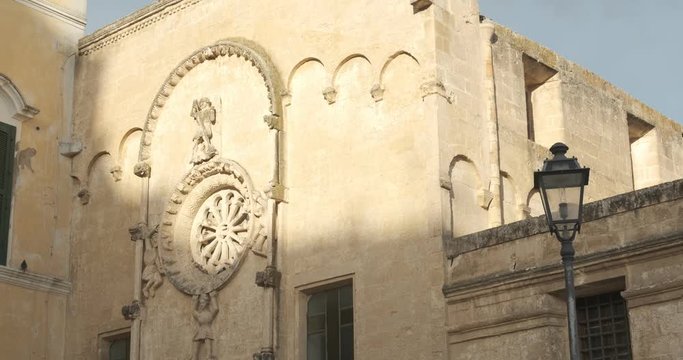 San Domenico Church in Piazza Vittorio Veneto of Matera. Stone rosette of Romanesque church in the historic center of the city.