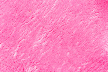 Textile plush background. Soft cozy fabric pattern in pink.