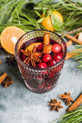 Mulled red wine on the rustic background. Selective focus. Shallow depth of field.