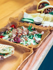 Salad and tortillas take away urban outdoor cafe