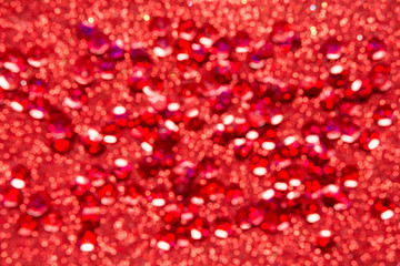 Abstract festive background .Christmas and New Year holidays glitter bokeh, glitter, bluer. Red color.