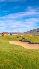 Vertical Long meandering sand trap on a golf course