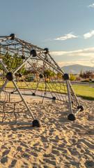 Vertical Metal climbing dome with nets in a playground